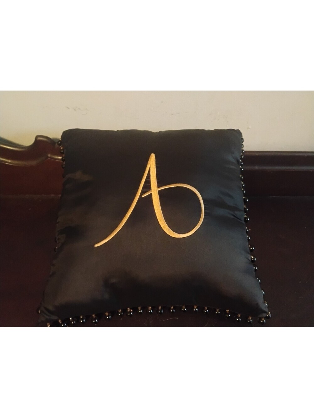 Borgata Black Satin Gold Embroidered Initial Throw Pillow with Beaded Trim